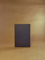 A black paper folder in The Daily pocket journal sizing 